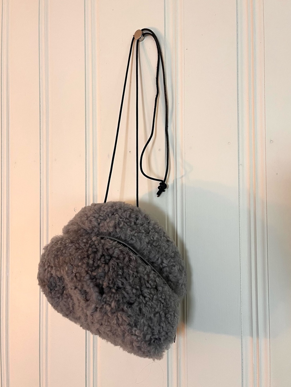 Soft, sheepskin purse made by artist